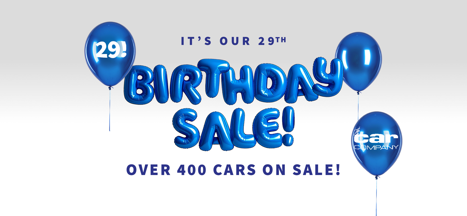 Blue birthday balloons spelling Birthday Sale