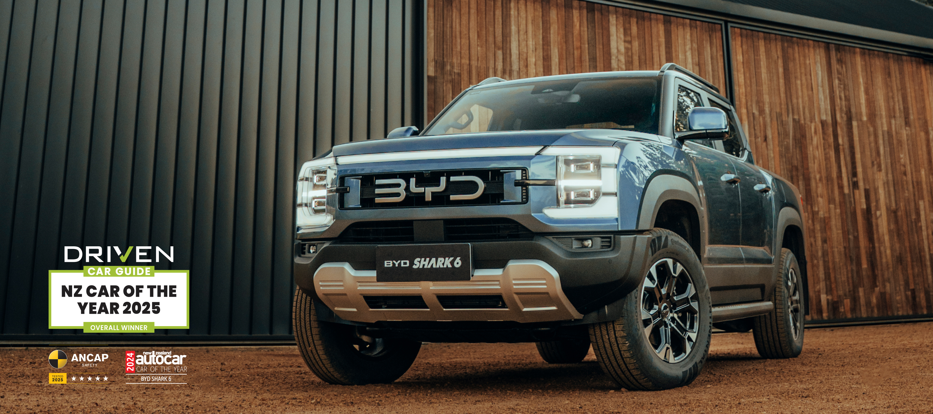 BYD Shark 6 with Driven Car Guide NZ Car of the Year Logo