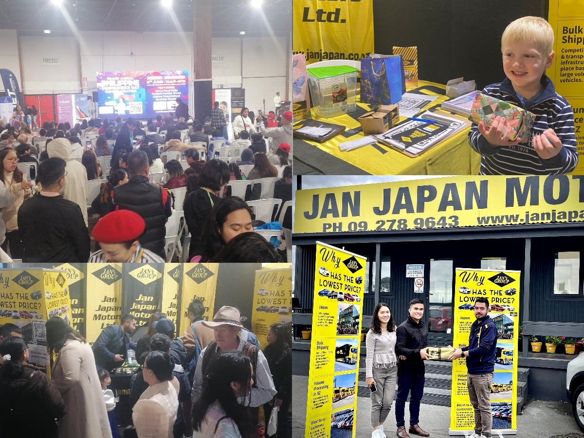 Representative from Jan Japan Motors Ltd handing over a mobile phone to a delighted attendee at the Philippine Independence Day celebration.